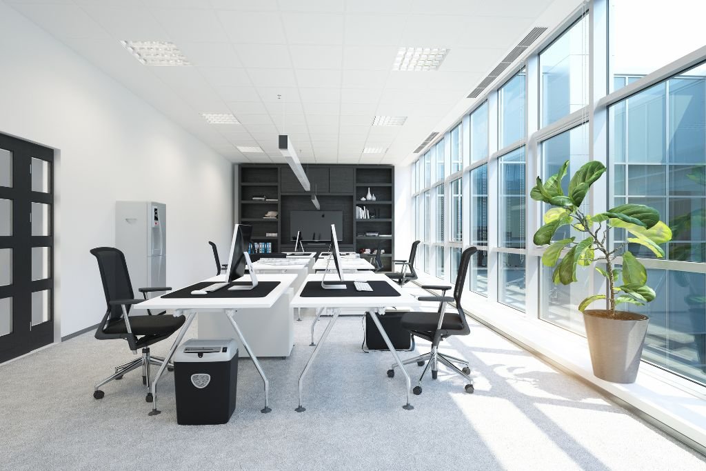 luxurious corporate office space with a large floor to ceiling sunny window